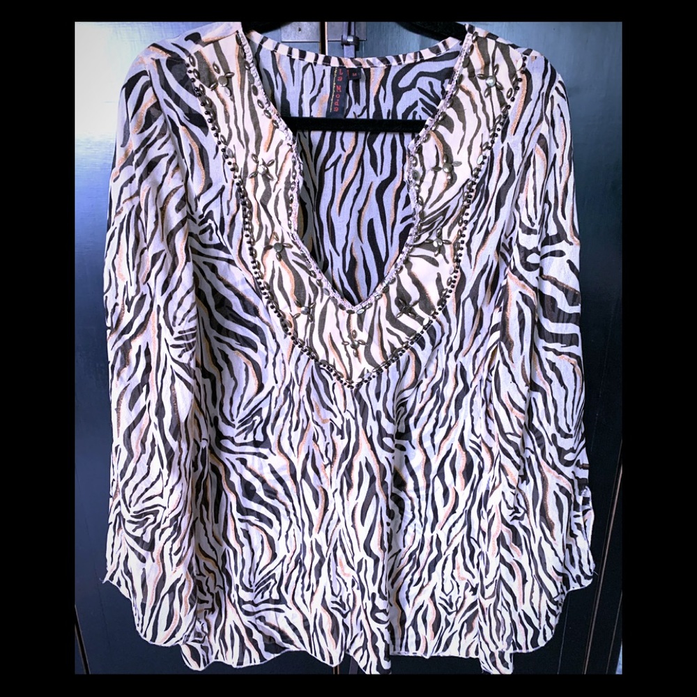Animal print v neck blouse